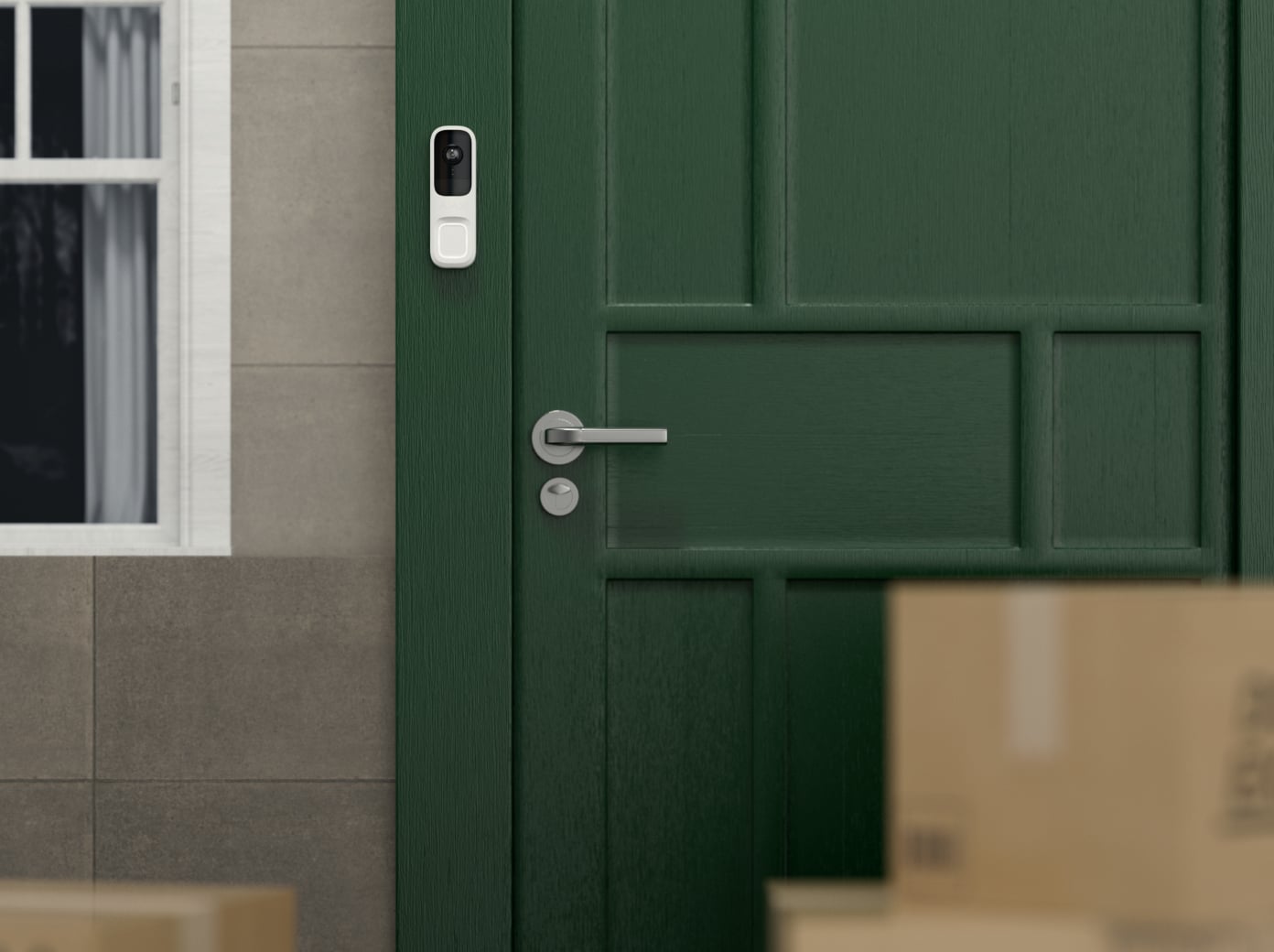 Sonnette vidéo Ajax DoorBell près d’une porte d’entrée